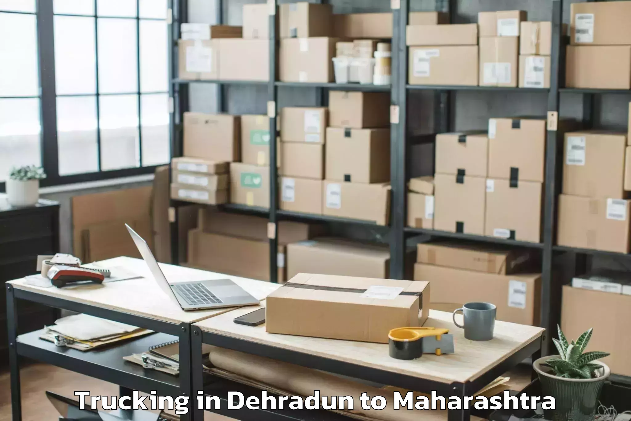 Book Dehradun to Chopda Trucking Online